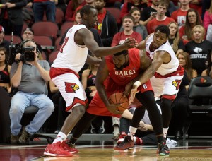 Akoy Agau and Anton Gill Louisville vs. Barry 11-1-2014 Photo by Adam Creech