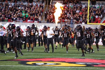 Entrance, Run Out. Scott Satterfield, Jean Luc-Childs Louisville vs. Notre Dame 9-2-2019 Photo by William Caudill, TheCrunchZone.com