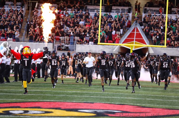 Entrance, Run Out. Louie the Card, Marshon Ford, Thomas Jackson, Scott Satterfield, Quen Head, Trennel Troutman, Jean Luc-Childs Louisville vs. Notre Dame 9-2-2019 Photo by William Caudill, TheCrunchZone.com