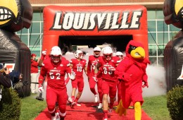 Nick Dawson-Brents, Micky Crum, Cole Hikutini, Louie the Cardinal Entrance Louisville vs. Syracuse 11-7-2015 Photo by William Caudill