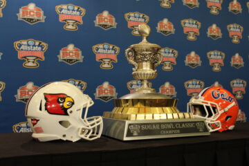 Louisville Helmet, Sugar Bowl Trophy, Florida Helmet. 2013 Sugar Bowl, New Orleans, LA Superdome. Photo by Mark Blankenbaker 1-2-2013