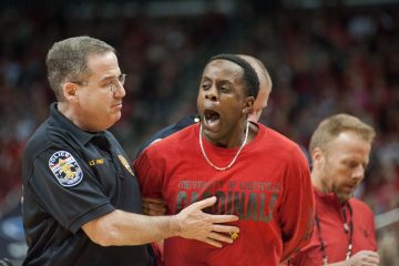 Fan Arrested on Court Louisville vs. Miami 2-11-2017 Photo By Wade Morgen TheCrunchZone.com