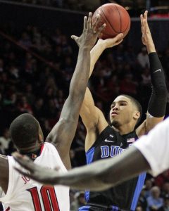 Duke’s Jayson Tatum, right, shooting over Louisville’s Jaylen Johnson, left, in the first half of their game during round 3 of the 2017 New York Life ACC Tournament at Barclays Center in Brooklyn, N.Y., Thursday, March 9, 2017. (Photo by Kevin Larkin, theACC.com)