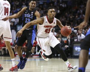 Louisville guard Donovan Mitchell (45) drives towards the hoop during the quarterfinals of the 2017 New York Life ACC Tournament at the Barclays Center in Brooklyn, N.Y., Thursday, March 9, 2017. (Photo by David Welker, theACC.com)