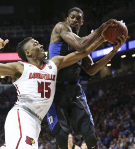 Louisville guard Donovan Mitchell (45) and Duke forward Amile Jefferson (21) battle for a rebound during the quarterfinals of the 2017 New York Life ACC Tournament at the Barclays Center in Brooklyn, N.Y., Thursday, March 9, 2017. (Photo by David Welker, theACC.com)