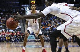 Louisville forward Ray Spalding (13) passes the ball to Louisville forward Mangok Mathiang (12) during the quarterfinals of the 2017 New York Life ACC Tournament at the Barclays Center in Brooklyn, N.Y., Thursday, March 9, 2017. (Photo by David Welker, theACC.com)