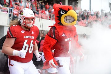 Louie the Cardinal, Cole Bentley, entrance Louisville vs. Wake Forest 10-27-2018 Photo by Austin Sullivan TheCrunchZone.com
