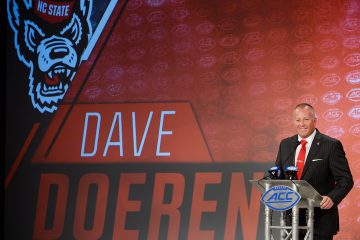 NC State head coach Dave Doeren addresses the media during the 2019 ACC Football Kickoff in Charlotte, N.C., Wednesday, July 17, 2019. (Photo by Sara D. Davis, the ACC)