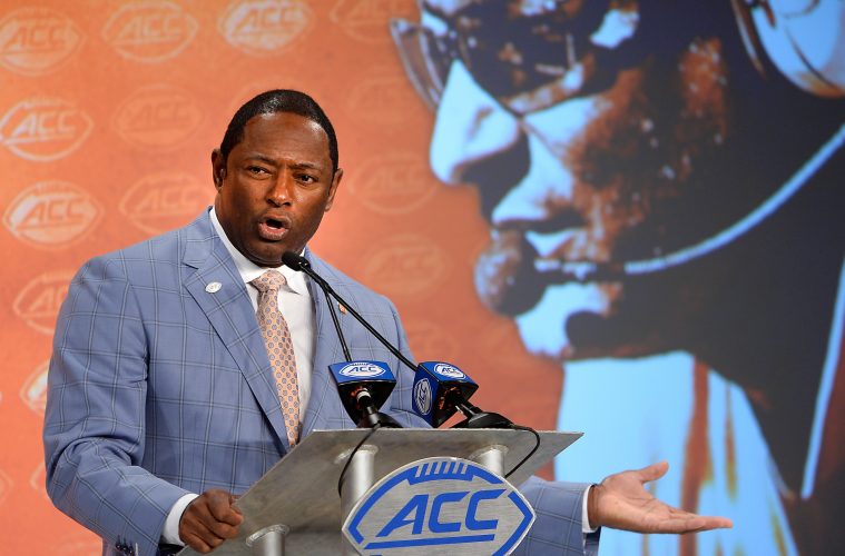 Syracuse's head coach Dino Babers addresses the media during the 2019 ACC Football Kickoff in Charlotte, N.C., Wednesday, July 17, 2019. (Photo by Sara D. Davis, the ACC)